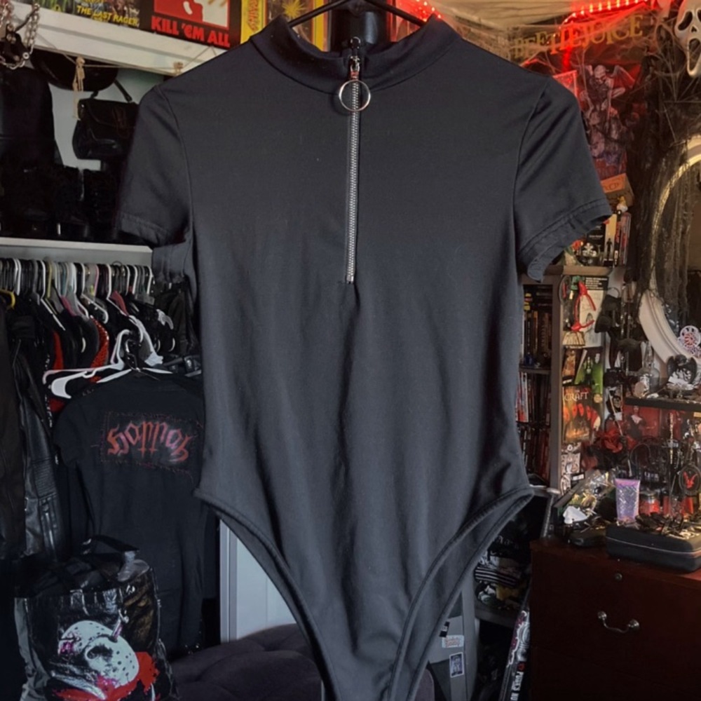 Black One piece with built in O-ring zipper in front